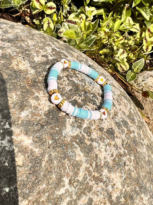 Blått armbånd med hjerter💛🩵